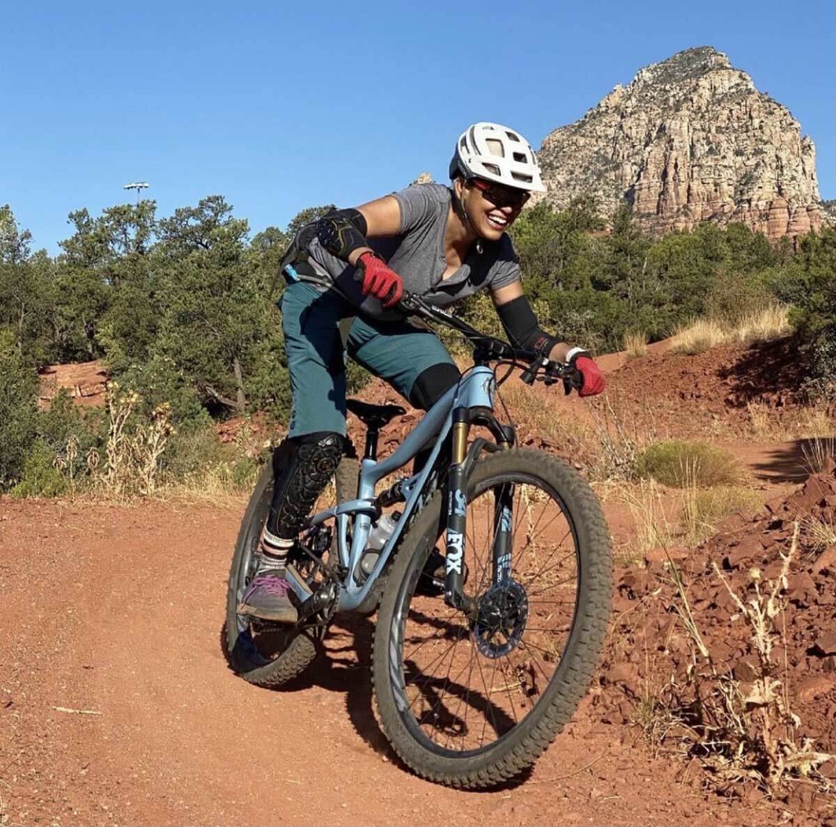 woman mountain biking in sedona arizona