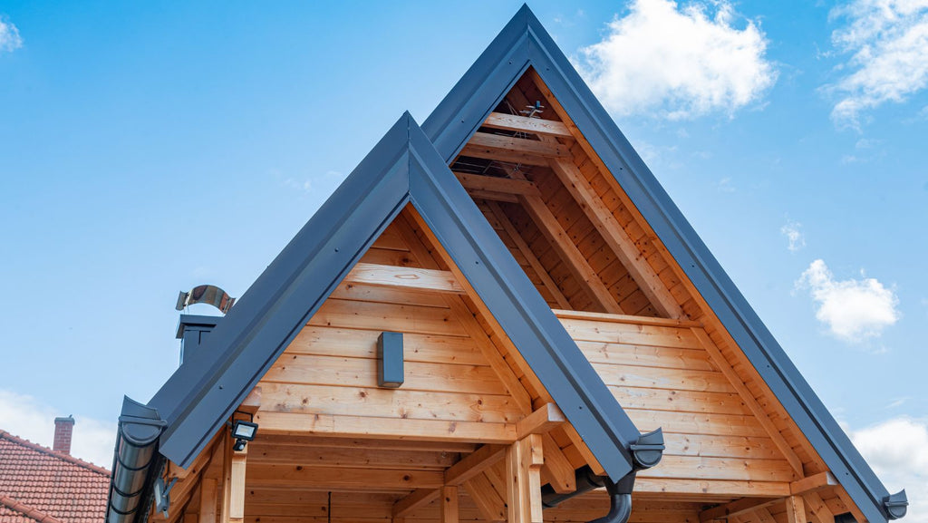 Wooden housing construction. The roof of a timber frame house.