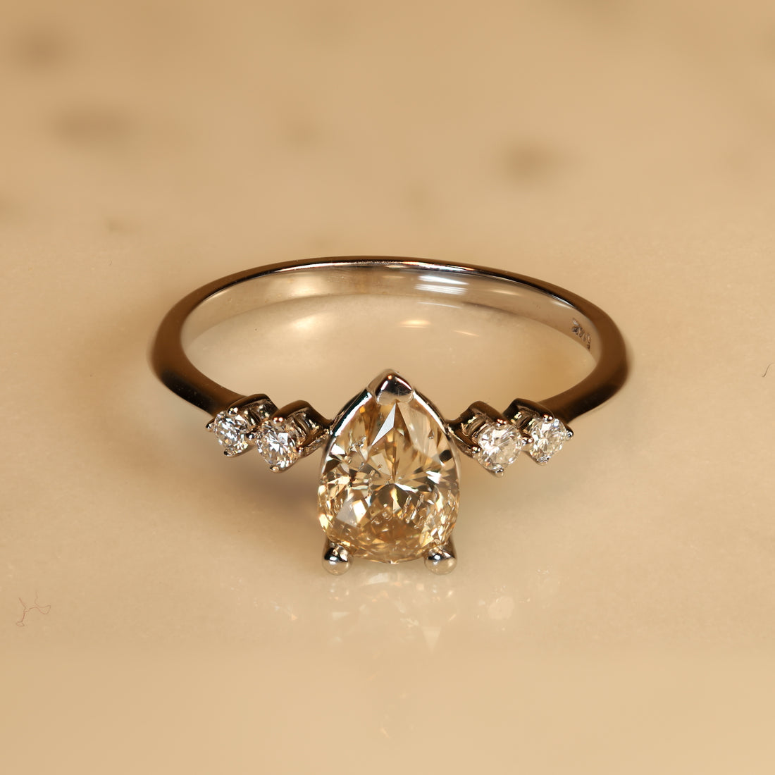 Rain Drop Ring with a 0.98 carat Pear Shaped Champagne Diamond