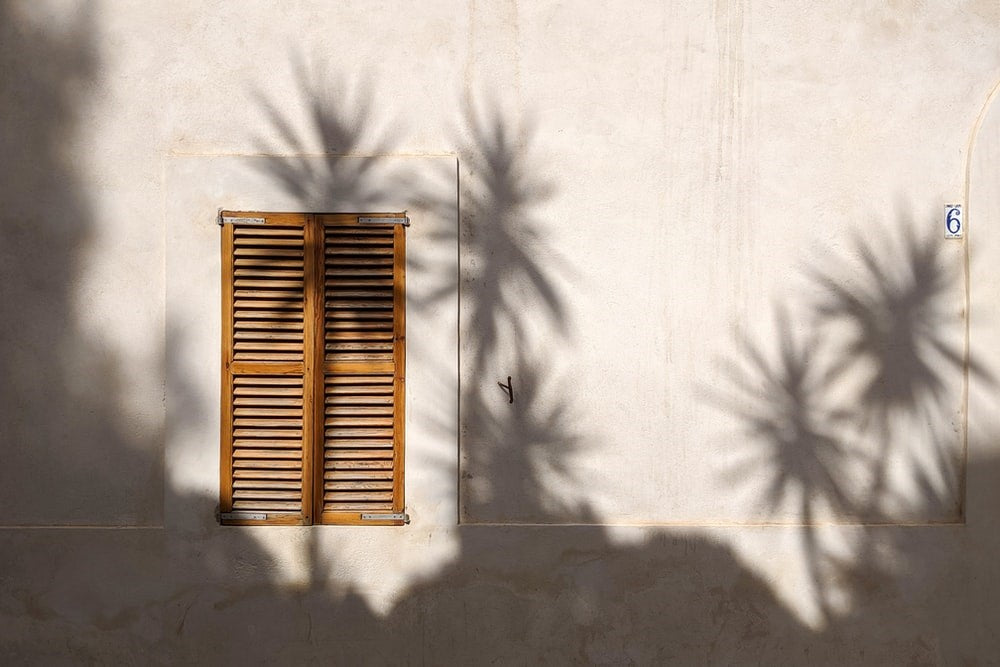 A closed window under the sunlight