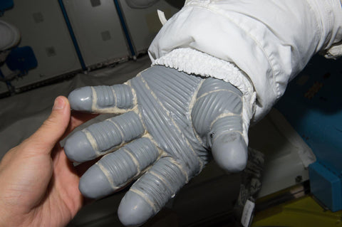 NASA astronaut EMU space suit glove with pleated rubber ribs