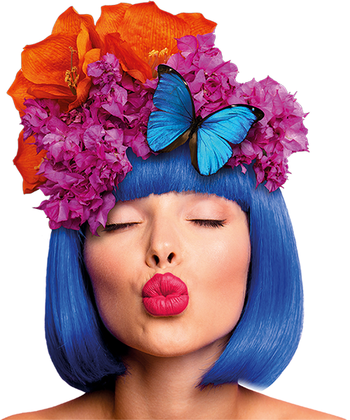 exotic woman with her hair swept up in flowers and butterflies and puckers at the camera 