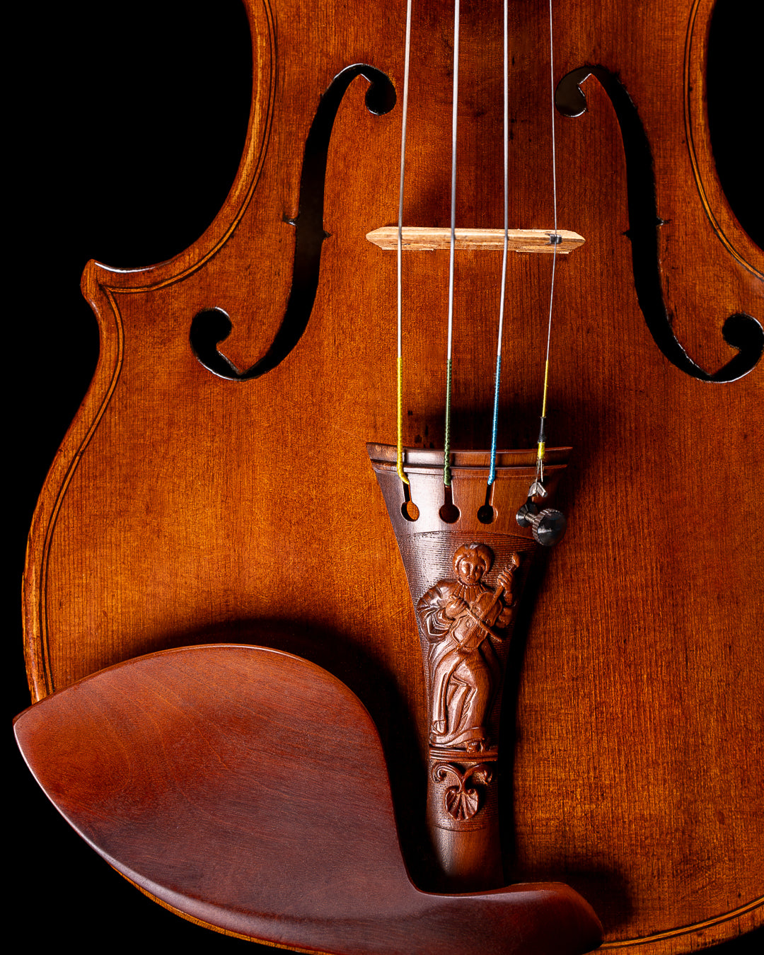 A Hellweg & Cloutier replica of Jean-Baptiste Vuillaume’s “Lady Blunt” tailpiece, depicted here in Mountain Mahogany wood.