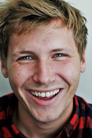 A stock headshot of a young man we're calling Bob. funny christmas cards ideas