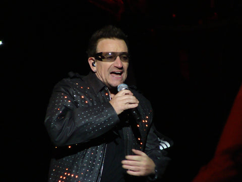 Bono in concert. U2 famous forced its album "Songs of Innocence" on to users iPods.