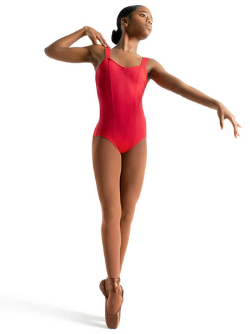 A Black girl is posing in a red leotard and brown Capezio pointe shoes.