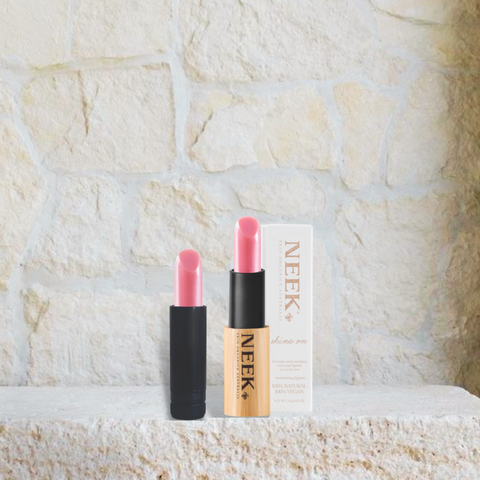 Neek vegan lip balm shine on with shine on refill beside it