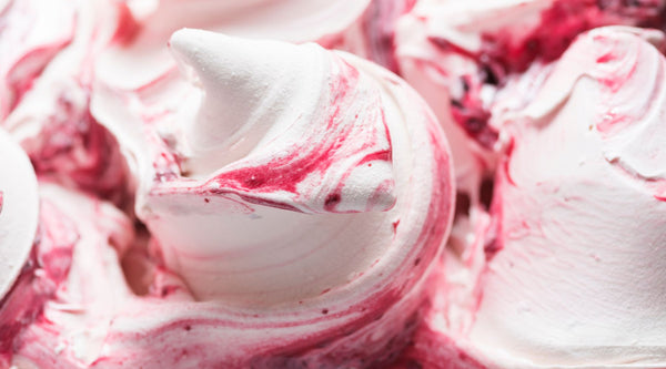 Mounds of vanilla gelato with a berry swirl