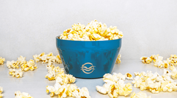 Blue Calicle bowl filled with popcorn