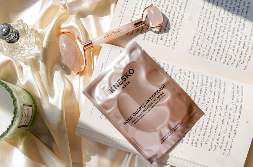 Rose Quartz Antioxidant Collagen Eye Mask alongside a Rose Quartz Gemstone Roller.