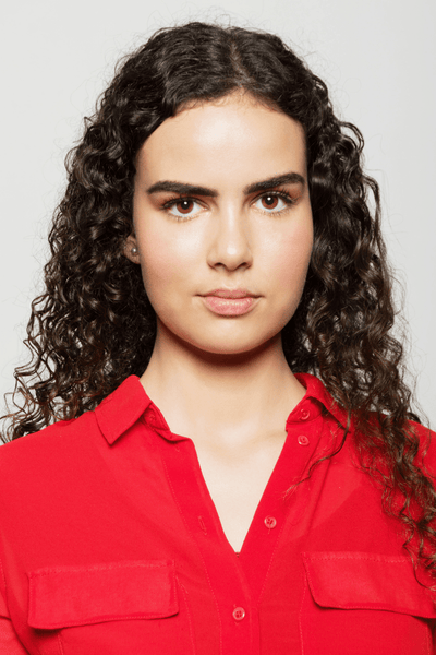 Woman with curly hair and red shirt