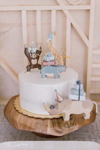 birthday cake with wooden animal toppers