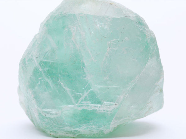 A Green Fluorite specimen is picture used for removing negative energy.