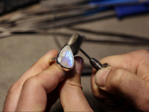 A grey moonstone ring with supposed metaphysical properties, especially for meditative or altered state of consciousness.