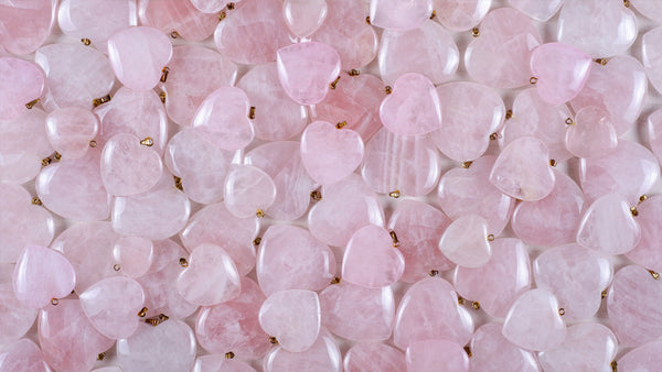 Rose Quartz necklace pendants formed into the shape of Rose Quartz Hearts.