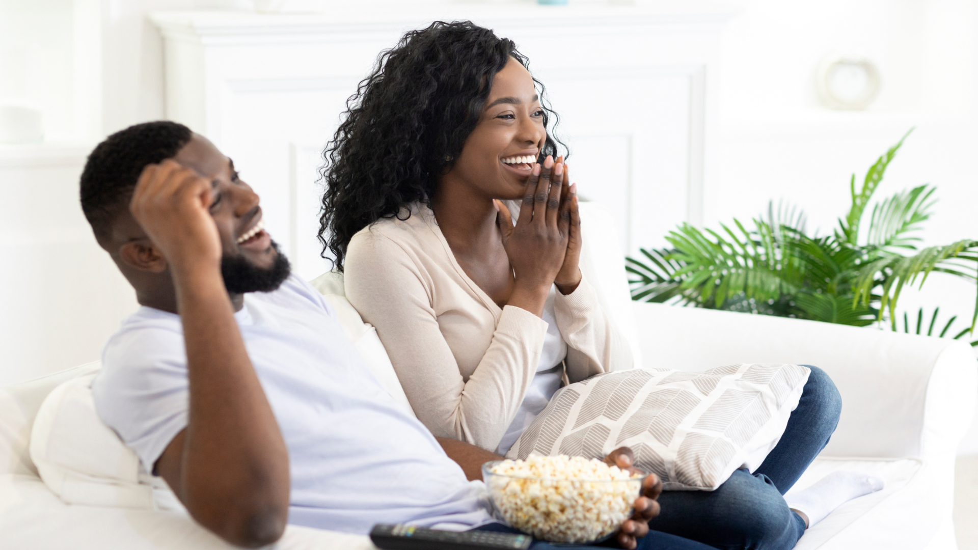 couple enjoying a relaxing movie night