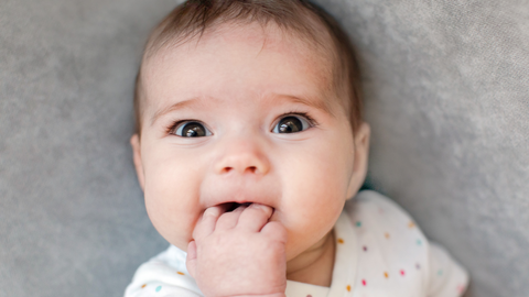 baby making funny face