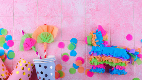 gender reveal pinata with boy or girl streamers