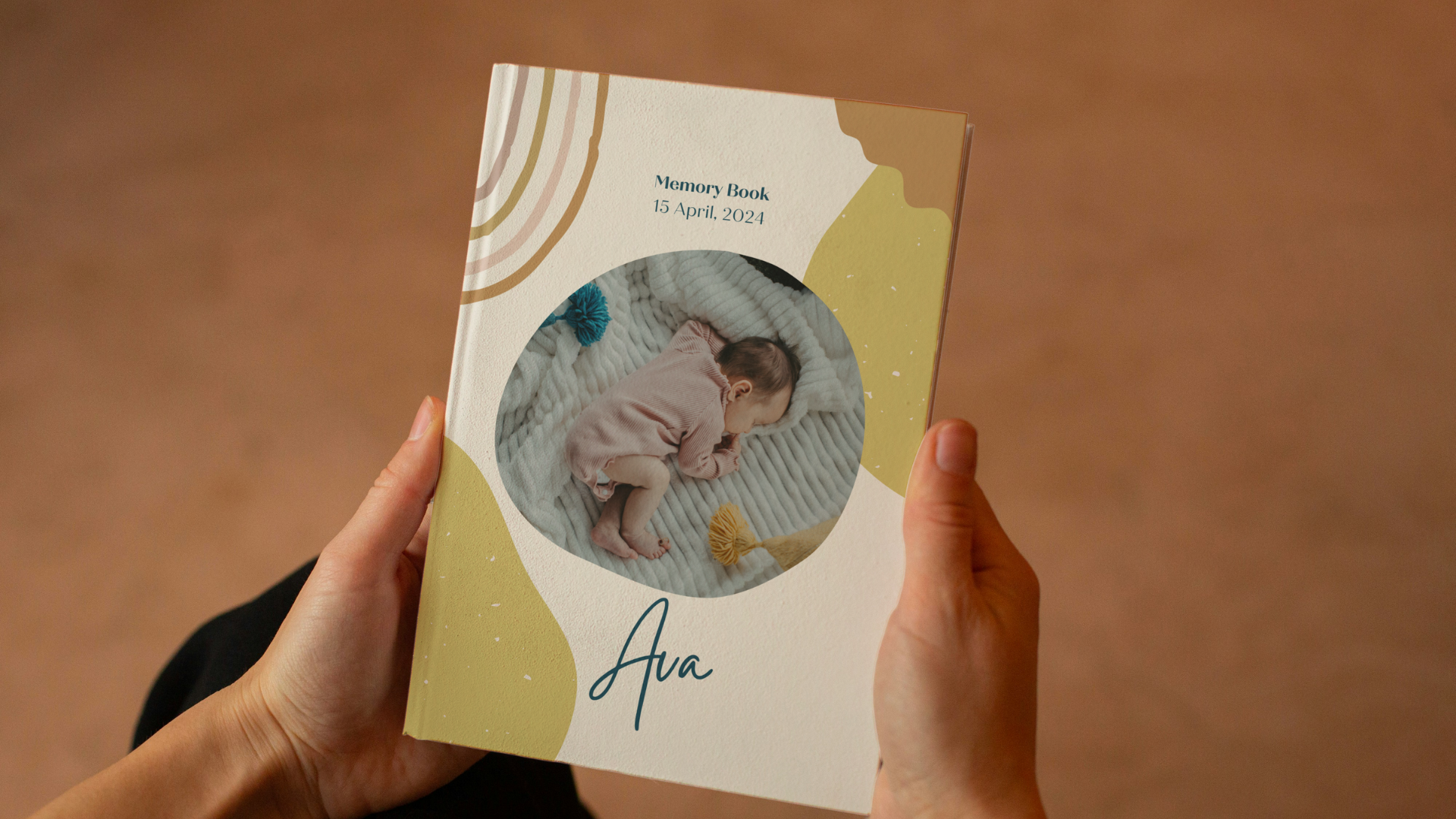 mom holding Ava's baby book in her hand