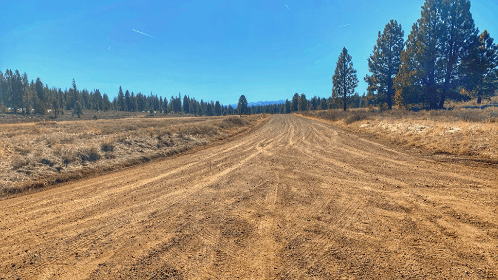 Wide view of Prosser Dam Road, completely snow free