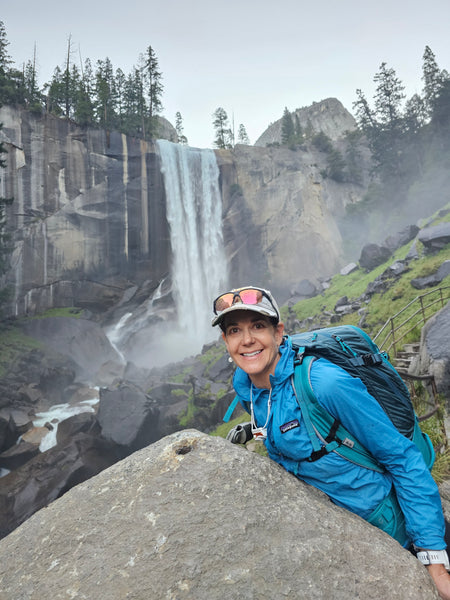 Person posing in front of Nevada Falls