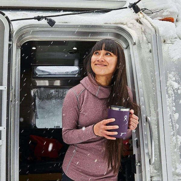 girl holding hydroflask mug