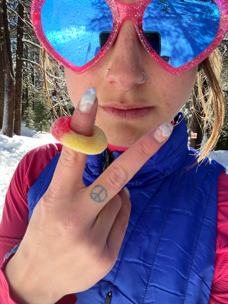 woman with peach ring on her finger