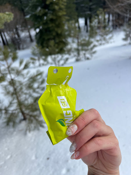 woman holding a pack of spring gel food