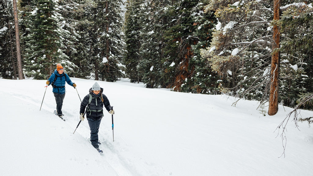 two people snowshoeing