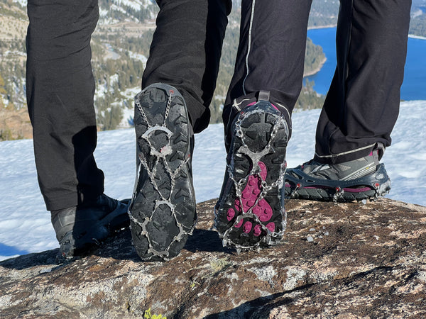 Picture of two people wearing snowline footwear traction