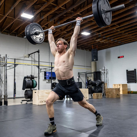 male athlete lifting weights