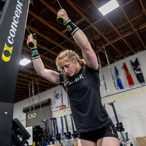 female athlete working out with mint sweatband
