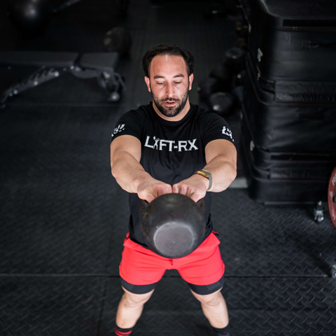 Male athlete kettlebell workout