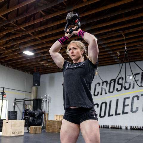 female athlete bottoms-up kettlebell