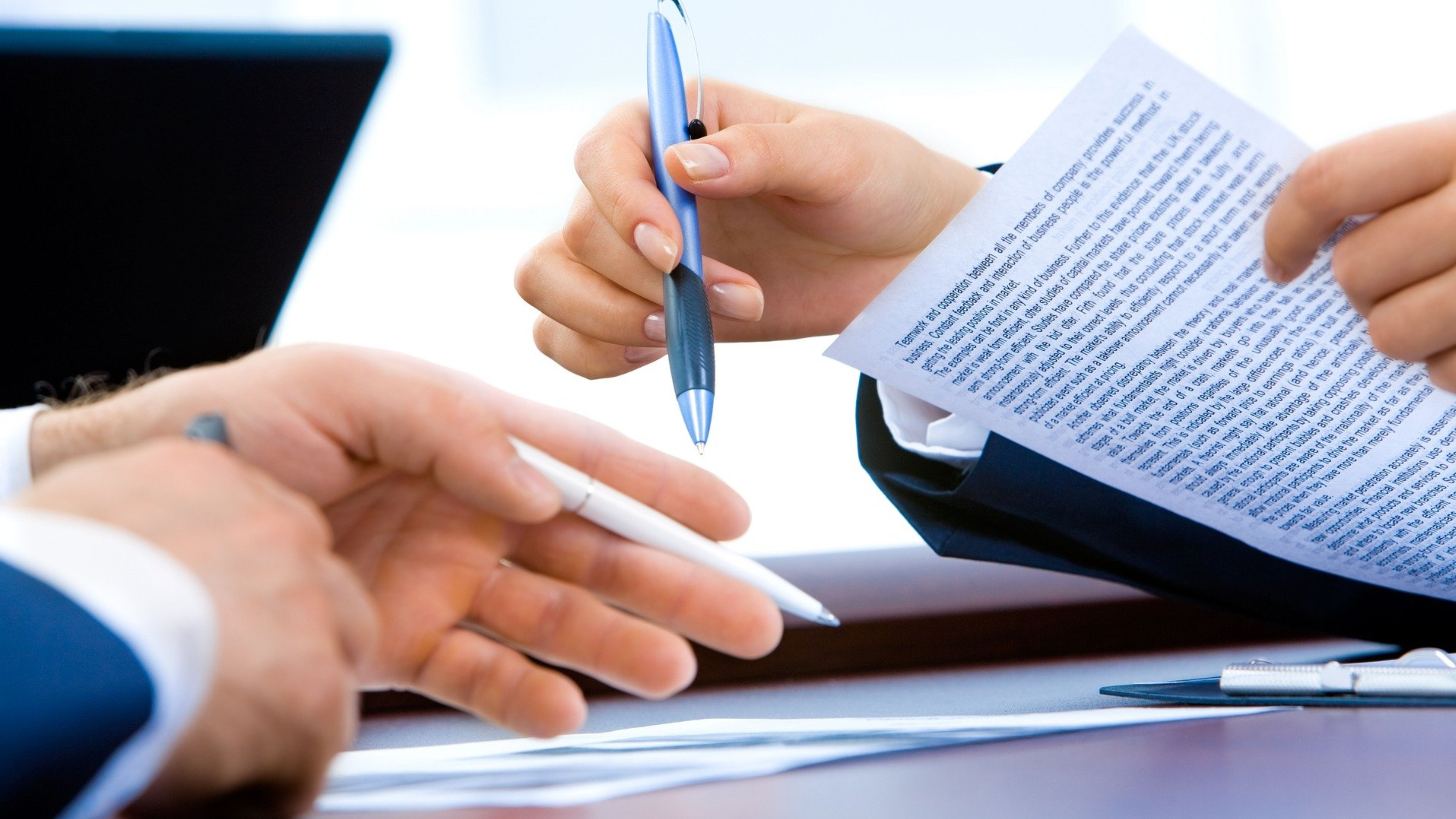 People completing paperwork during a solar consultation with Jackson Solar LLC