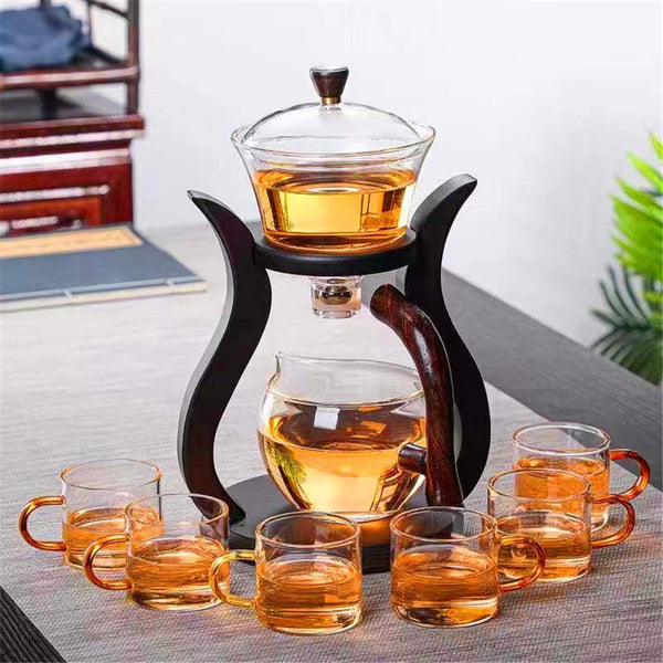 https://cdn.shopify.com/s/files/1/0605/6715/9018/products/RORA_Lazy_Kungfu_Tea_Set_Magnetic_Automatic_Glass_Teapot_Suit_4_600x.jpg?v=1659582275