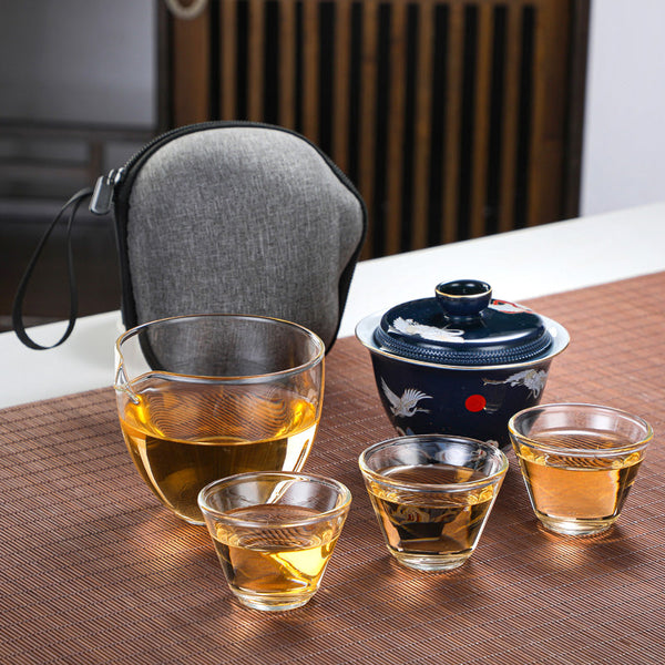 https://cdn.shopify.com/s/files/1/0605/6715/9018/products/RORA_Travel_Chinese_Kung_Fu_Ceramic_Teapot_set_Tea_Sets_5_5_600x.jpg?v=1659581662