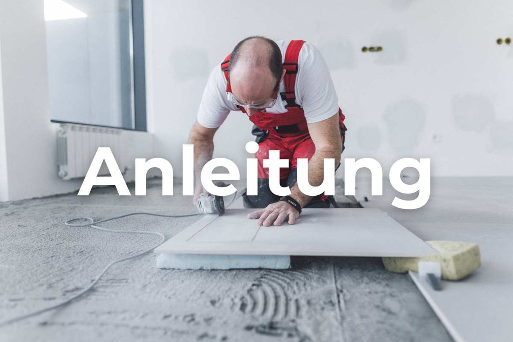 A craftsman flexing a large porcelain stoneware slab with an angle grinder and a 125 mm diamond disc