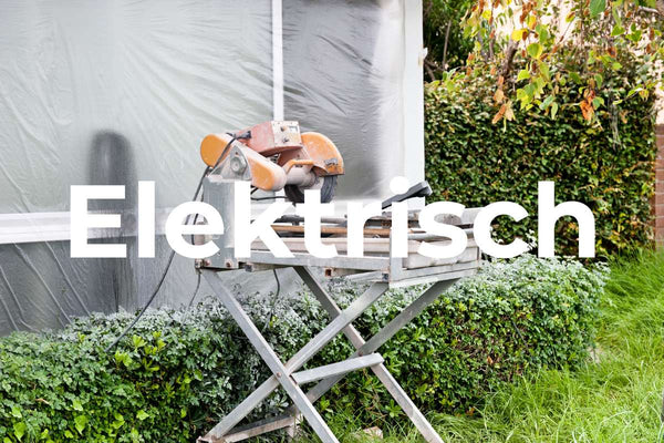 Mobiler Elektrischer Fliesenschneider im Garten zum Fliesen schneiden aufgebaut
