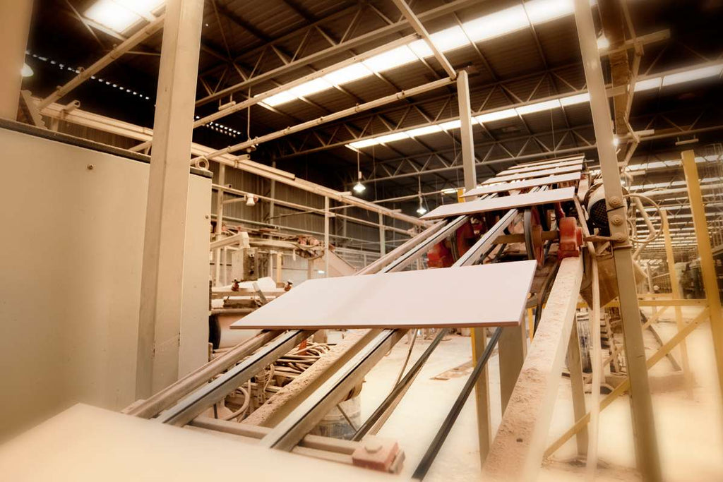 Porcelain stoneware tiles and slabs in production on the way to pressing