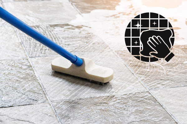 Tile surface is cleaned with a mop and water