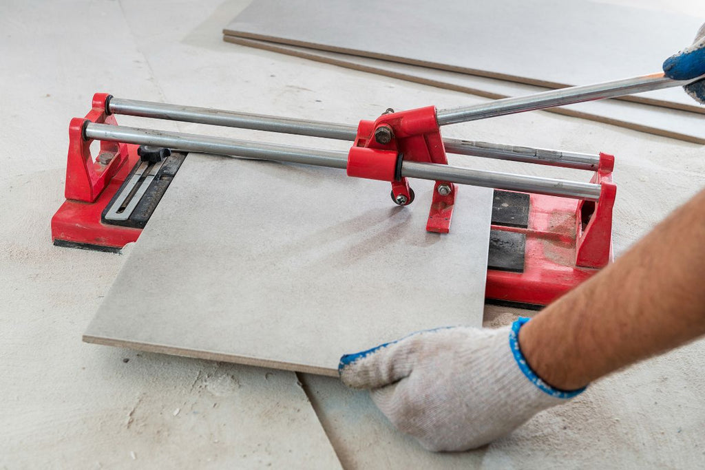 Cut tiles with the tile cutter