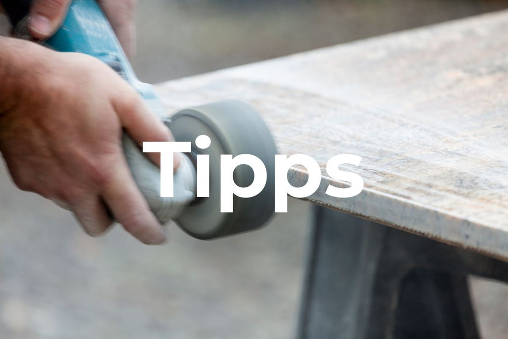 Handyman polishing granite with a polishing machine