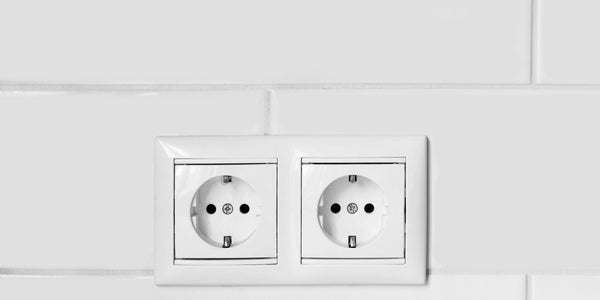 Sockets in the bathroom mounted on tiles