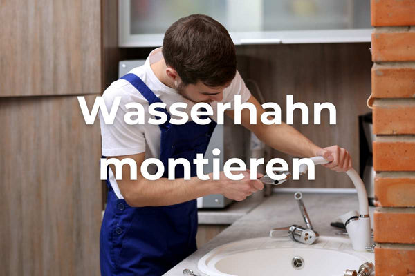 Ein Wasserhahn wird im neuen Waschbecken montiert