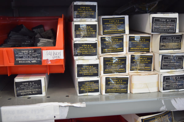 A2 Jacket Labels on shelves at the Aero leather Clothing factory