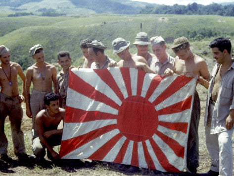 American Soldiers Holding Captured Japanese Flag