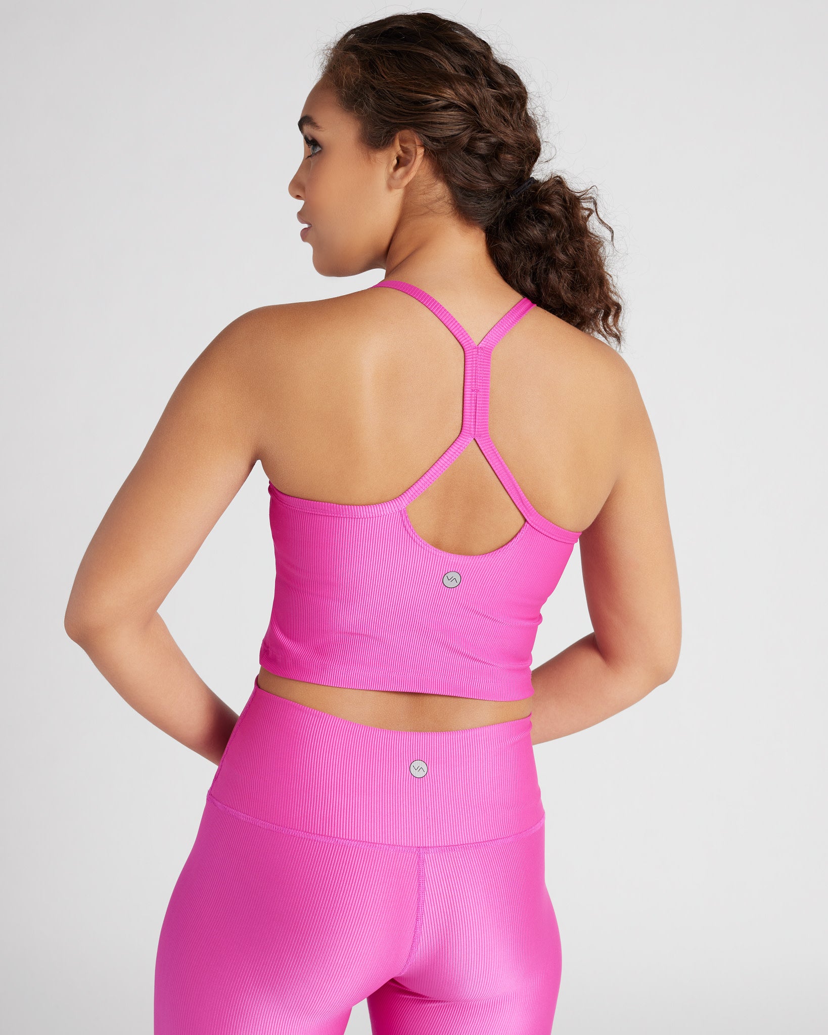 hidden side and under-bust support, the Moving Comfort Jubralee Bra keeps B  to E cups lifted while minimizing bounce
