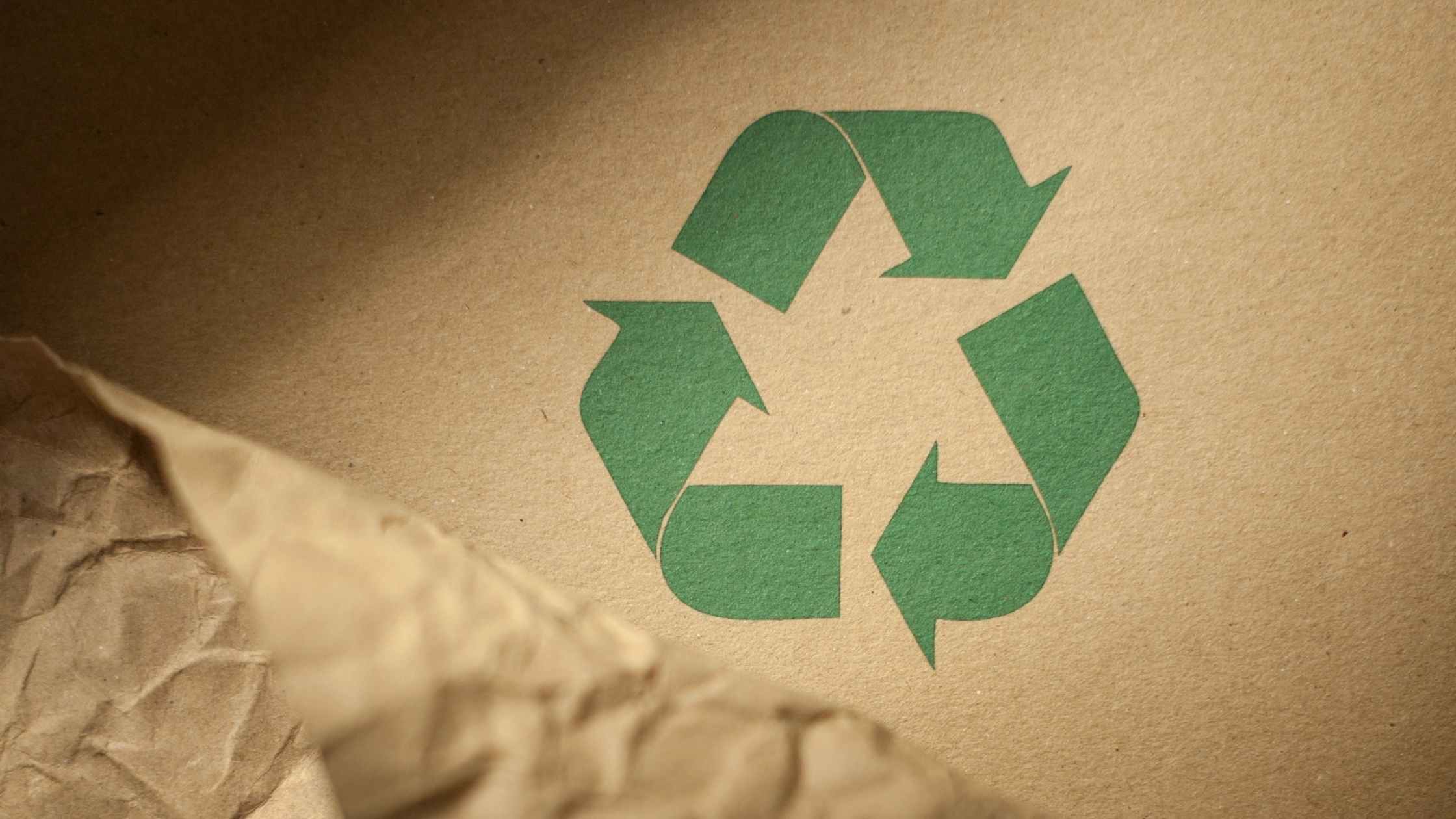 Image of Cardboard with recycle symbol - recycled toilet paper