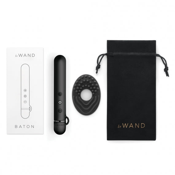 Le Wand Baton Slim Vibrator - Black against a white background with all of the extras and contents of the box